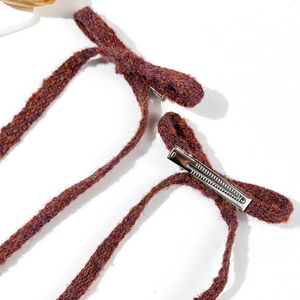 Brown knit bow hair clips for women with textured yarn and metal duckbill clips