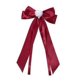 Elegant wine red satin bow hair clip with a white fur ball and long trailing ribbons