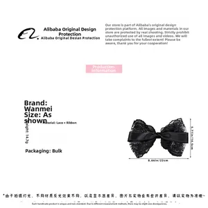 Detail showing oversized black lace bow hair clip with double-layer mesh and ribbon texture