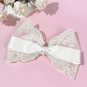 Elegant oversized white lace bow hair clip for women with delicate floral embroidery details