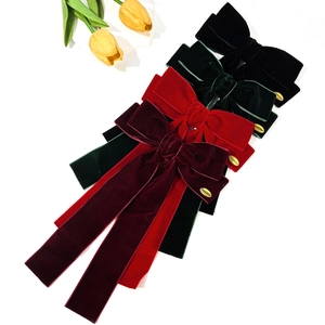 Barrettes à cheveux élégantes avec nœud en velours et longs rubans en noir et rouge