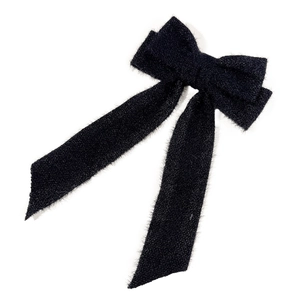 Elegant black velvet hair clip with long ribbons and double-layered bow design for women