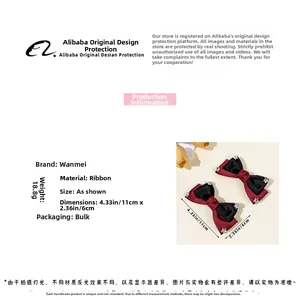 Detail of red and black lace bow hair clips with rhinestones and 11x6cm dimensions