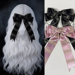 Barrette à nœud avec chaîne croix dorée et finition pailletée noire et rose
