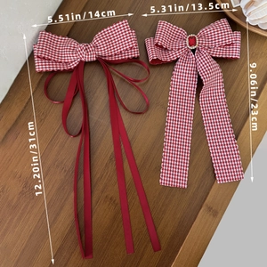 Elegant red plaid bow hair clip set with ribbons and ruby gemstone ornament