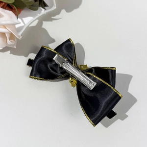 Bohemian style black ribbon bow hair clip with gold trim edge and metal duckbill clip