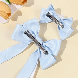 Sweet light blue ribbon bow hair clips set with white fur balls and long streamers