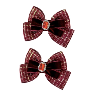 Elegant pair of wine red tweed and velvet bow hair clips with center ruby gemstone