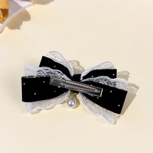 Elegant black velvet lace bow hair clip with rhinestones and a pearl pendant
