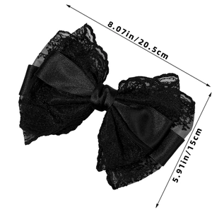 Detailed view of black lace and satin bow hair clip with 20.5cm by 15cm dimensions