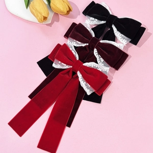 Three velvet hair bows with lace trim in black, burgundy and red for elegant styling
