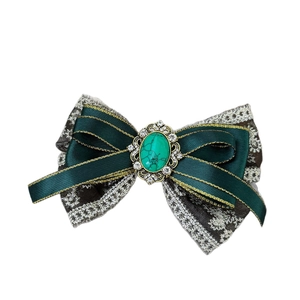 Retro golden lace bow hair clip with dark green ribbon and center turquoise gemstone