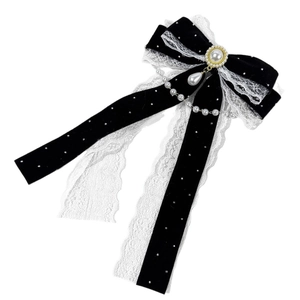 Elegant black velvet bow hair clip with lace edges and hanging pearl chain pendants