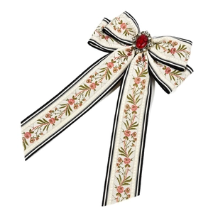 Bohemian floral bow hair clip with red gemstone and vintage gold metal engraving