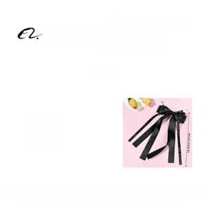 Detail showing dimensions of the 14.5x27cm black ribbon bow hairclip accessory