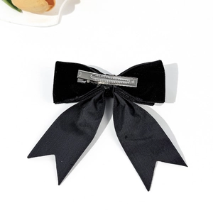 Elegant black velvet bow hair clip with satin ribbons and secure silver metal duckbill clip