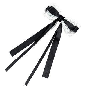 Barrette à cheveux élégante en dentelle noire et blanche avec longs rubans