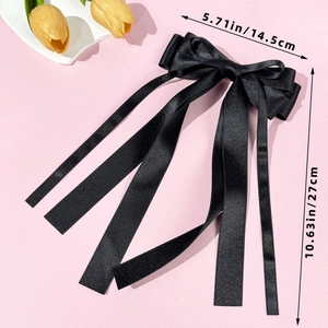 Detail showing the dimensions of the elegant black satin bow hairclip with long ribbons