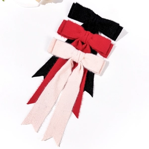 Elegant set of 3 wool bow hair clips in black, red, and pink with long ribbons