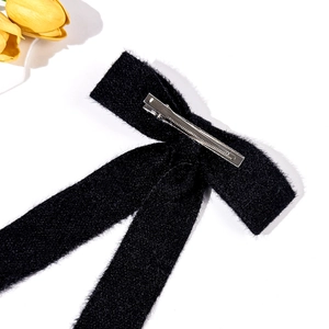 Elegant black velvet bow hair clip with silver metal alligator grip for women