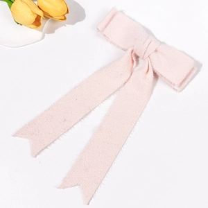 Elegant pink plush wool bow hair clip with long ribbons for autumn and winter