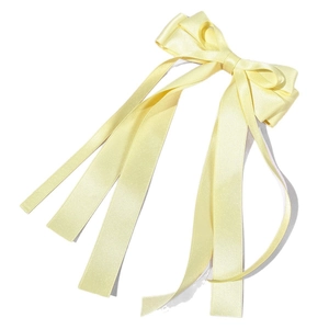 Elegant pale yellow satin ribbon hair clip with long streamers for a stylish look