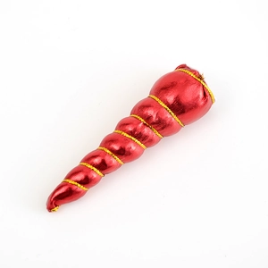 Detail of red spiral unicorn horn accessory with metallic finish and gold thread wrap