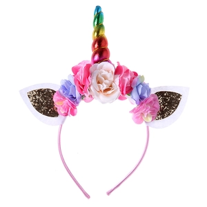 Kids unicorn headband with colorful horn and artificial flowers for Halloween party