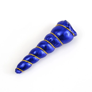 Detail of dark blue metallic unicorn horn with spiral texture and gold braided cord trim