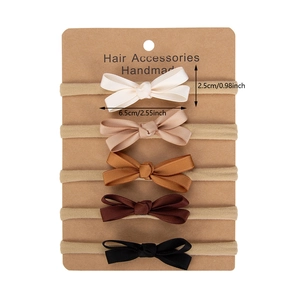 Set of 5 minimalist baby nylon headbands with satin bows in earth tone colors