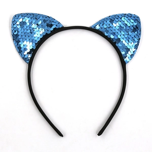 Detailed close-up of shiny blue sequins on cat ear headband for kids party wear