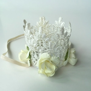 Detail of lace baby crown headband featuring chiffon roses and ivory white lace floral design