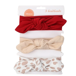 Détail du lot de 3 bandeaux bébé avec oreilles de lapin sur carte de support