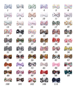 Collection of printed baby headbands with various patterns like floral, leopard and holiday themes