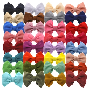 Set di 28 fasce per capelli in nylon per neonati in colori assortiti e tessuto goffrato