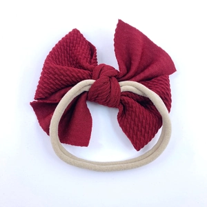 Burgundy waffle fabric bow baby headband with stretchy nude nylon hair band for girls