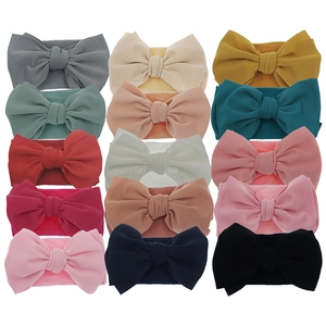 Detailed grid showing 15 colorful ribbed nylon baby bow headbands with high elasticity