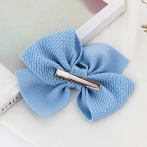 Light blue knitted bow hair clip with silver metal alligator grip for kids girls
