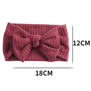 Bandeau bébé en maille gaufre avec grand nœud 18x12cm en rose foncé pour nouveau-né