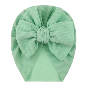 Mint green waffle fabric baby turban hat with large bow for girls aged 0-5 years
