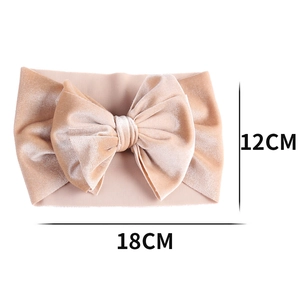 Solid beige velvet baby headband with large bow detail for girls, 18cm wide