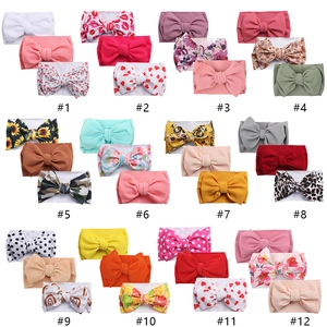 12-pack baby bow headband set with waffle texture and floral prints for infants