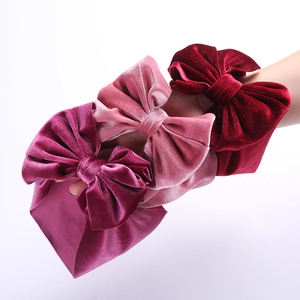 Three-piece set of velvet bow headbands for baby girls in dark red, pink, and burgundy