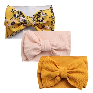 Detailed set of baby bow headbands featuring floral patterns and waffle texture fabrics