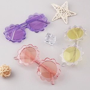 Sunflower shaped kids sunglasses in purple pink and yellow colors with clear frames