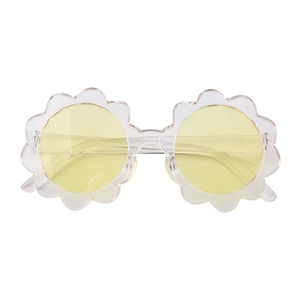 Close-up of translucent sunflower-shaped frame and light yellow lenses for kids