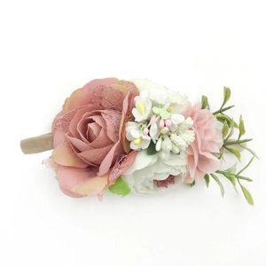 Pink fabric rose baby headband with white lace details and elastic nylon strap