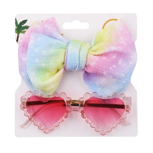 Kids heart sunglasses with pink gradient lenses and rainbow bow headband set on card