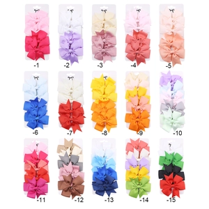 Set de 15 pares de pinzas para el pelo con lazos de cinta de falla en colores variados