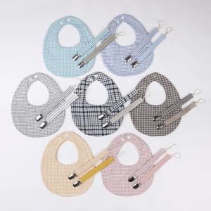 7-color set of cotton baby bibs and pacifier clips with snap button closure